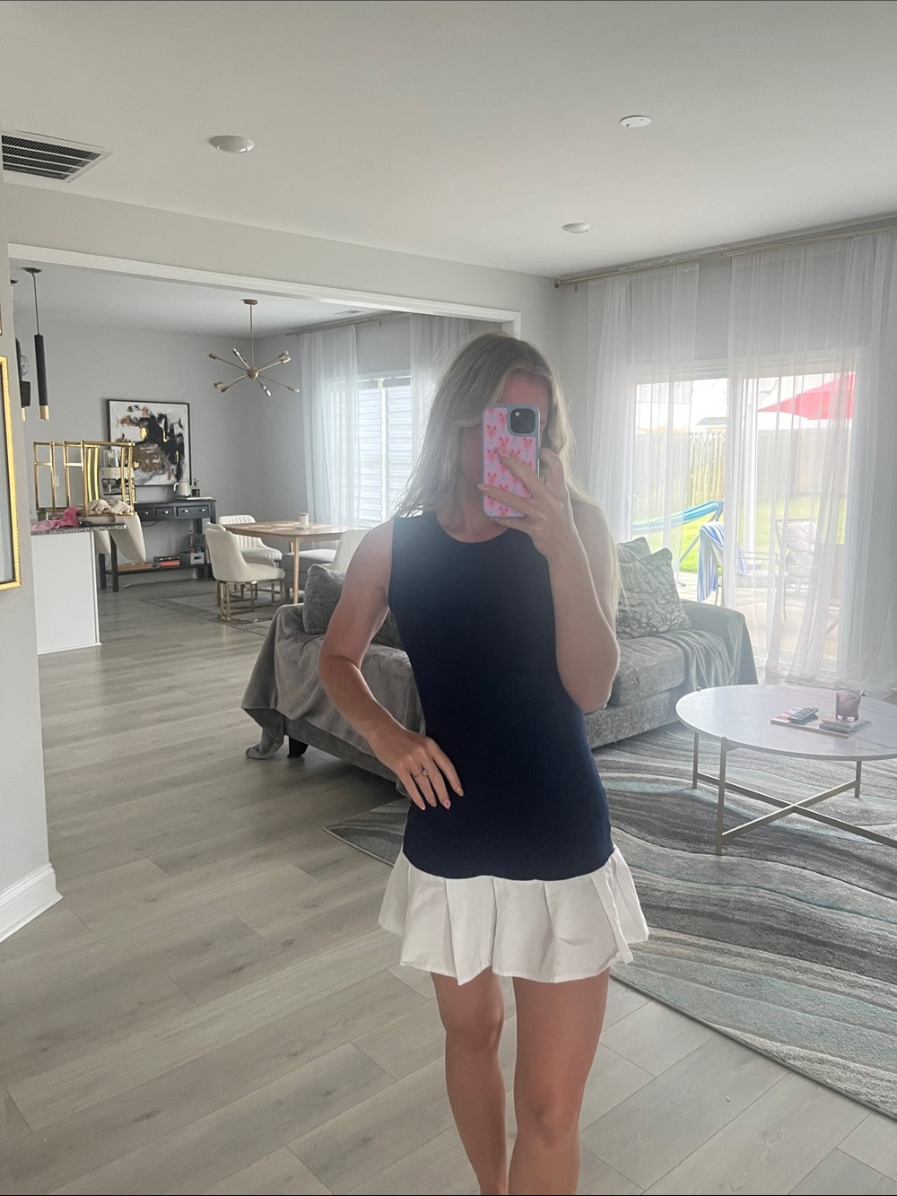 Navy Sleeveless Mini Dress with White Ruffle Hem